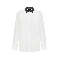 ÚCHÈ Black Collar White Shirt - Classic white long sleeve button-up featuring a stylish black faux leather collar, a button closure, and a single front pocket for a modern twist on a timeless design