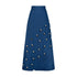 Cowrie detail denim maxi skirt featuring blue denim fabric and cowrie shell embellishments.