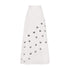 White cowrie detail denim maxi skirt featuring circular cut-outs and cowrie embellishments.