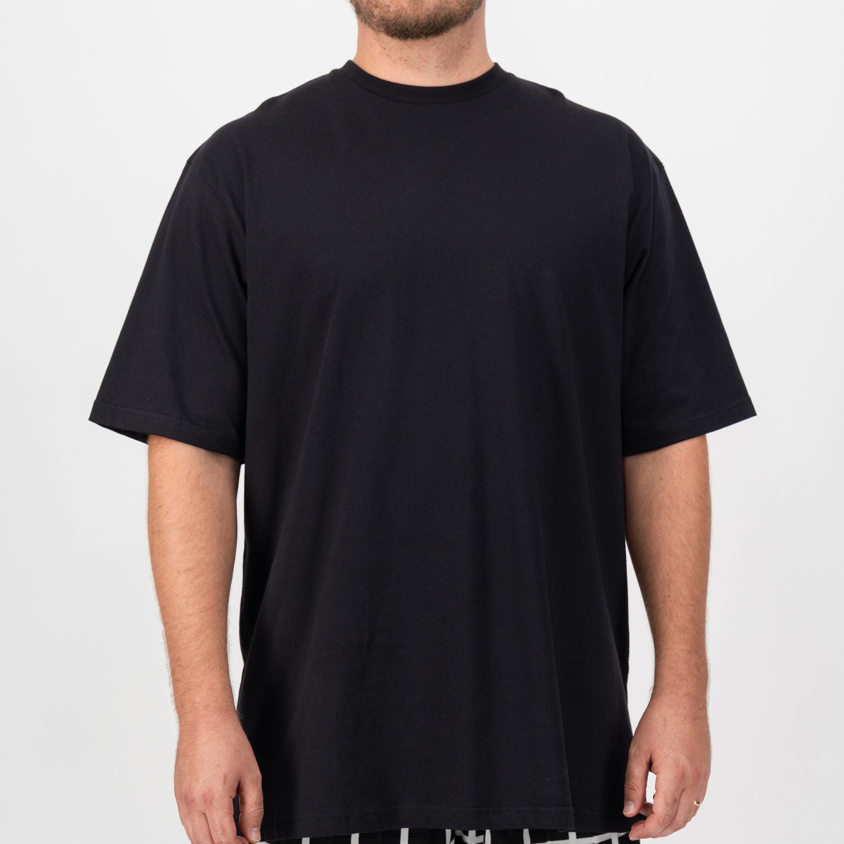 Oversized black T4AH Tee with crew neck and short sleeves, designed for gender-neutral wear.