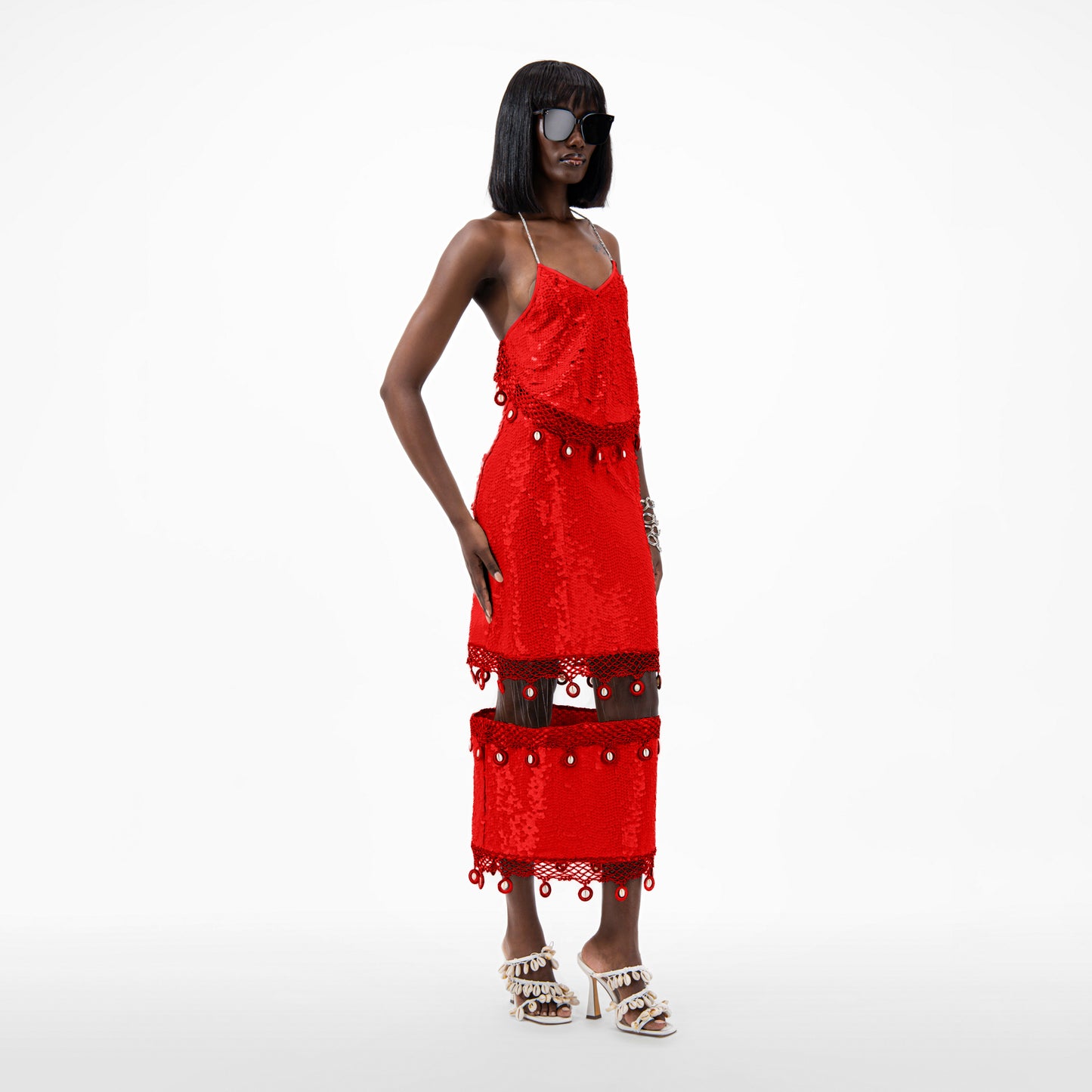 Sequin Halter Neck Crop Top in red, featuring a crystal-embellished halter strap and open back design with cowrie shell details.